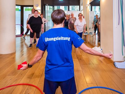Übungsleiter/-in bei der Arbeit